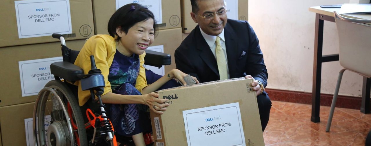 NT&T joins DellEMC in a charity event to distribute computers to the disabled people in The Will to Live Center.